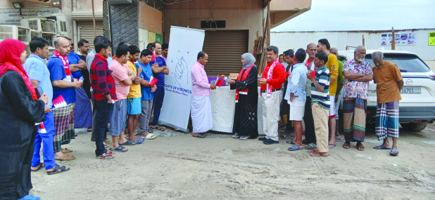 <p><em><strong>Food and beverages being distributed to workers.</strong></em></p>
<p>Community group Lights of Kindness celebrated Bahrain&rsquo;s 54th National Day by distributing lunch packets, sweets, fruit and water bottles to workers in Sitra.</p>
<div class="explain-selected-button explain-selected-circle"></div>